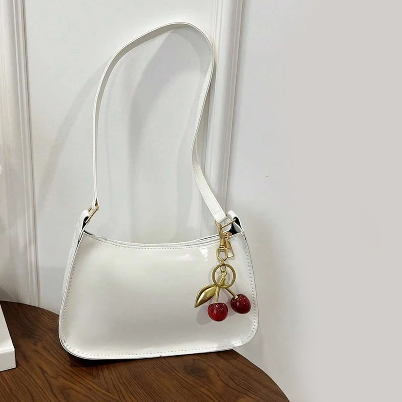 Bolsa de couro pu feminina versátil moda cor sólida cereja pingente bolsa de omb - Imagem 16