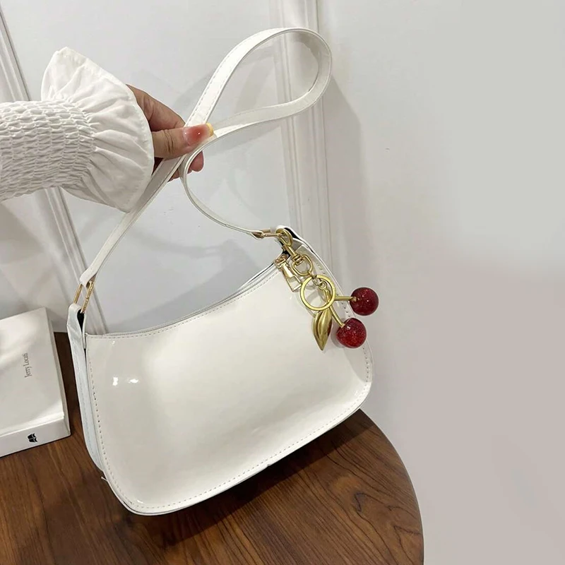 Bolsa de couro pu feminina versátil moda cor sólida cereja pingente bolsa de omb - Imagem 17