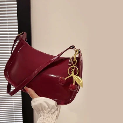 Bolsa de couro pu feminina versátil moda cor sólida cereja pingente bolsa de omb